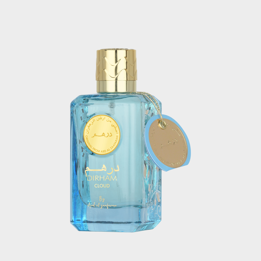 Dirham Cloud perfume bottle with gold cap and label on a light gray background