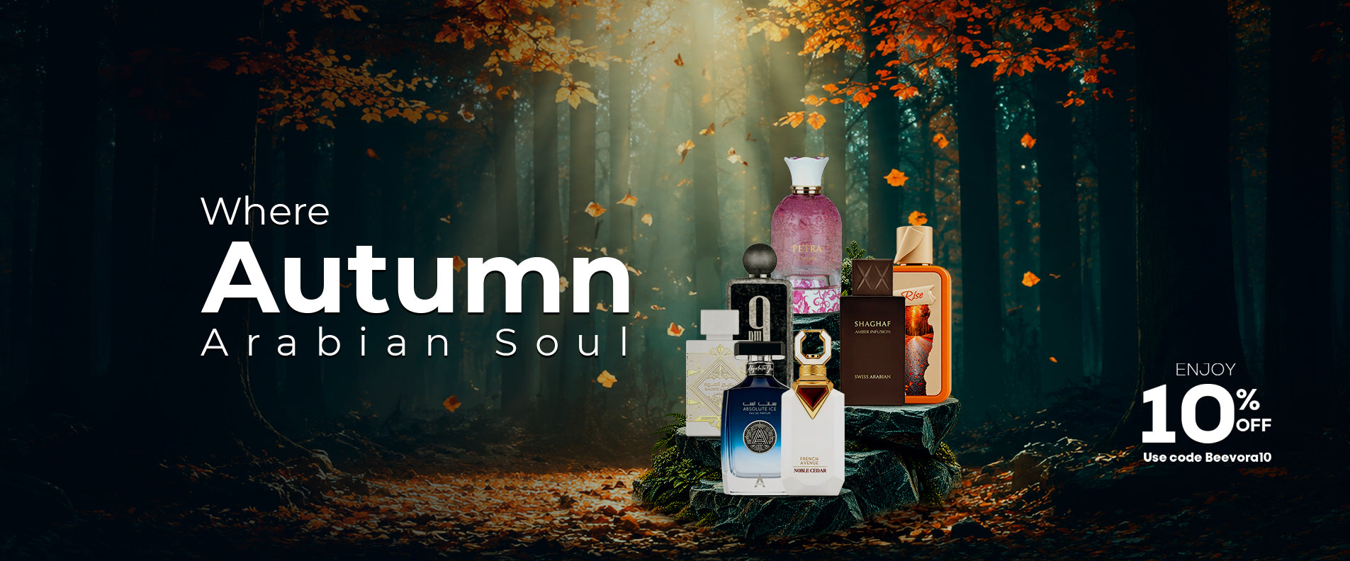 A promotional banner for 'Autumn Arabian Soul' perfume, featuring a group of various perfume bottles arranged on a mossy log in a dark, atmospheric forest with falling autumn leaves. The text 'Where Autumn Arabian Soul' is displayed on the left, and a '10% OFF' discount badge is on the bottom right.