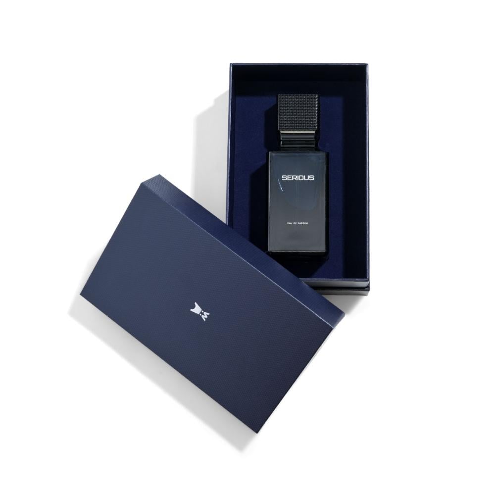 Authentic Al Majed Oud Serious 100ml Eau de Parfum bottle inside open navy blue velvet presentation gift box at Beevora UK