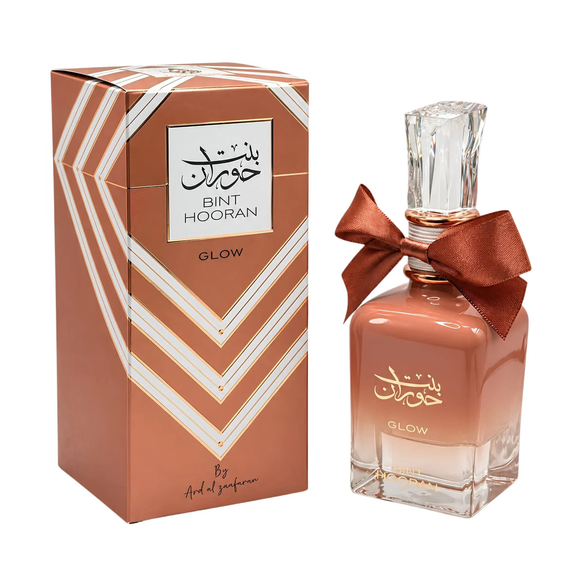 Authentic Ard Al Zaafaran Bint Hooran Glow 100ml Eau de Parfum rose-gold bottle with ribbon bow and presentation box at Beevora UK
