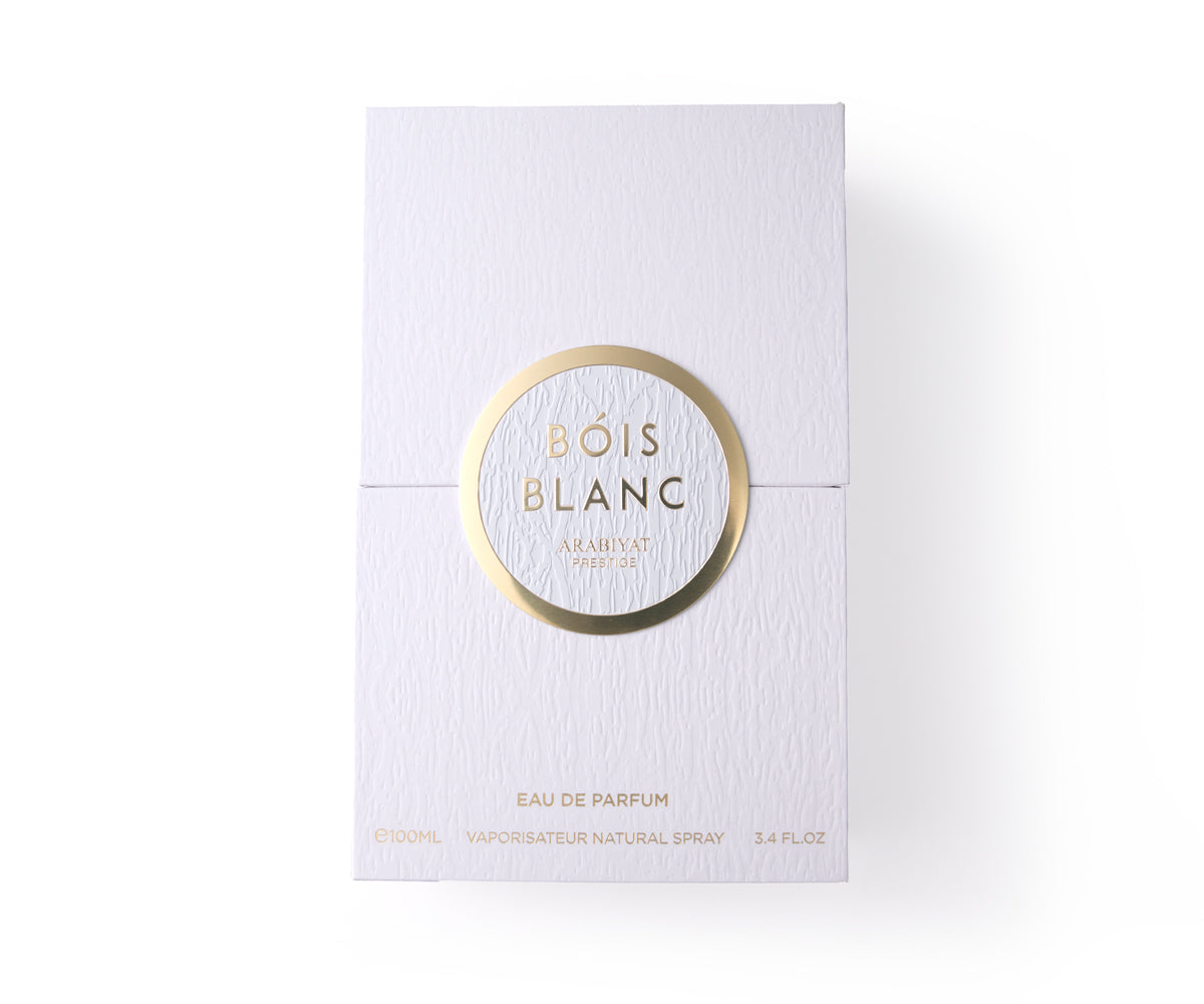 A white rectangular perfume box with a gold circular logo reading BOIS BLANC, photographed on a clean white background.