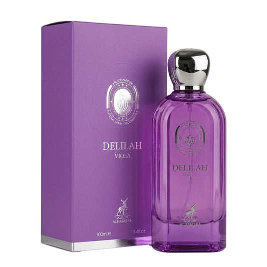 A purple Delilah Viola perfume bottle with a silver cap stands next to its matching purple box on a white background.