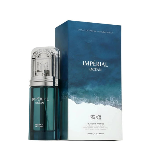 Impérial Ocean French Avenue cologne bottle and packaging box. The bottle is a deep teal green with a silver cap, standing next to its blue and white textured box.
