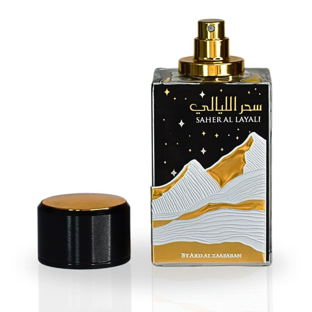 Saher Al Layali Perfume bottle with mountain design and gold accents on a white background