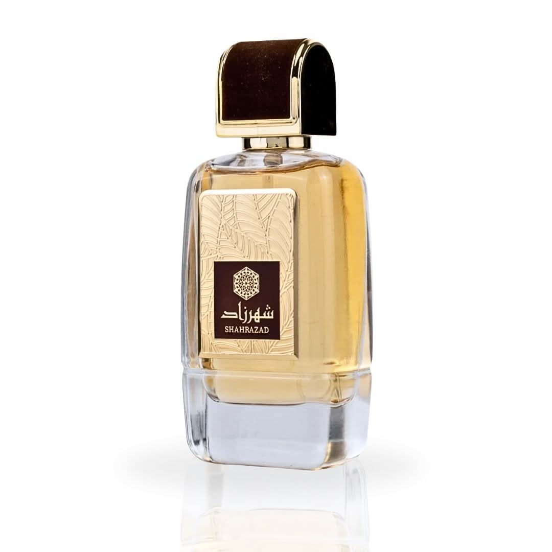 Shahrazad Perfume bottle with gold cap and label on a white background