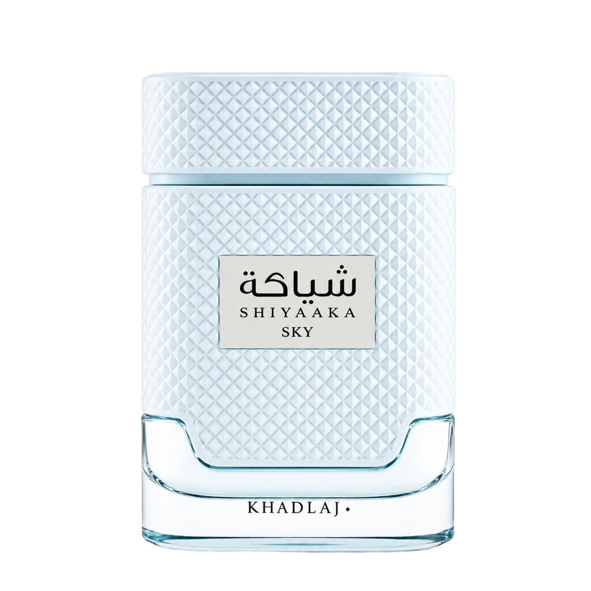 Shiyaaka Sky perfume bottle by Khadlaj, featuring a textured light blue and white diamond-patterned body with a clear glass base, on a white background.